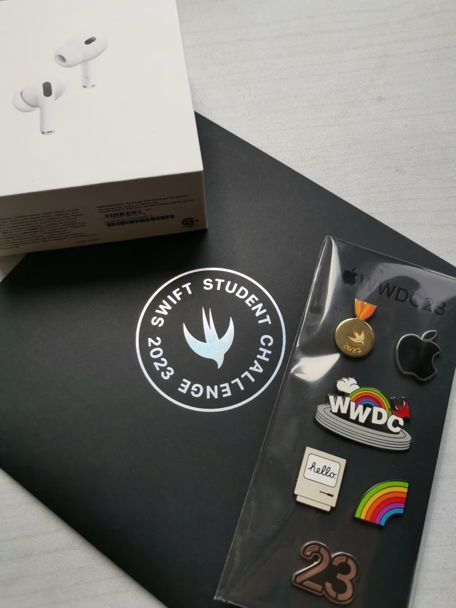 WWDC23 winner pins and AirPods Pro